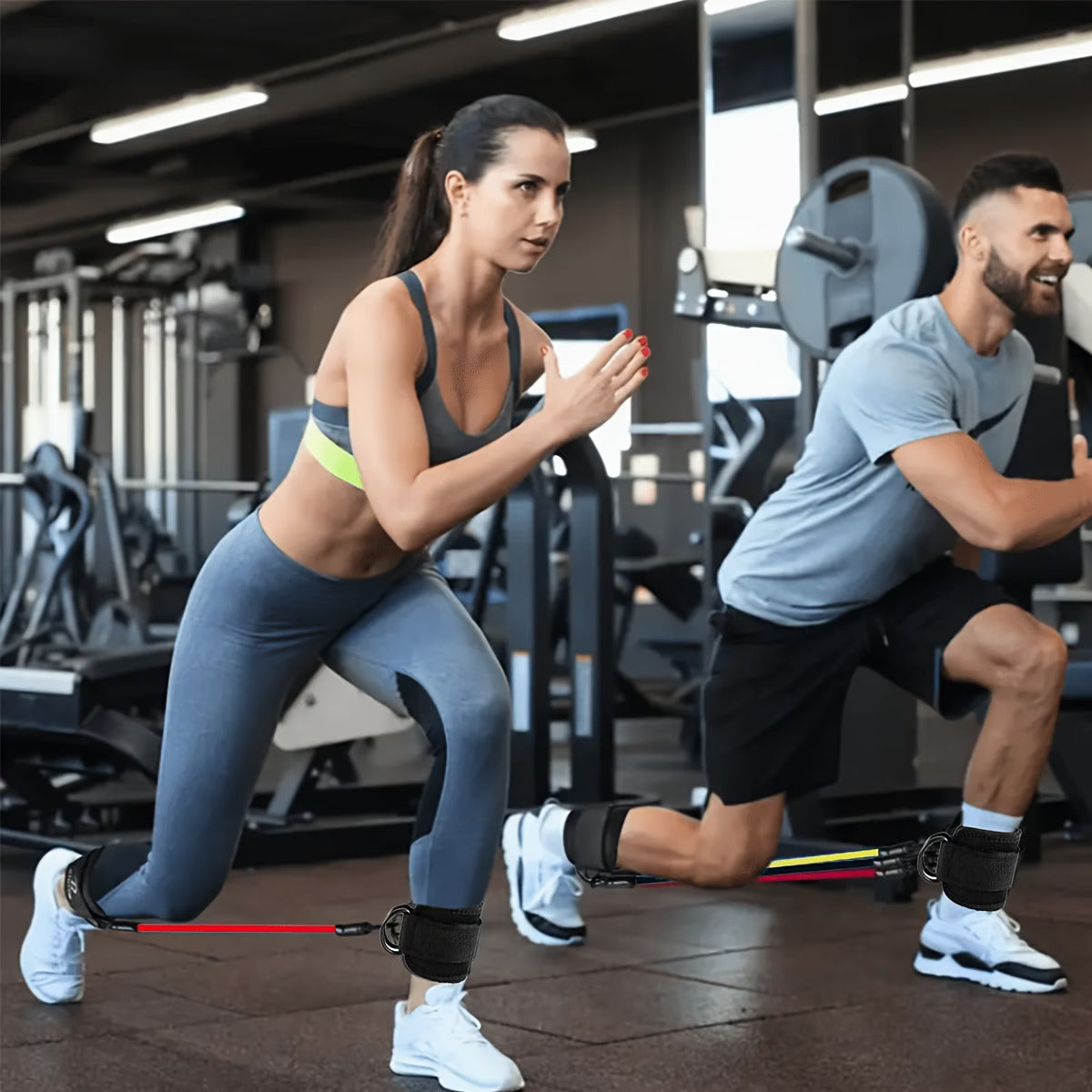 Two people using ankle resistance bands for lunges at the gym